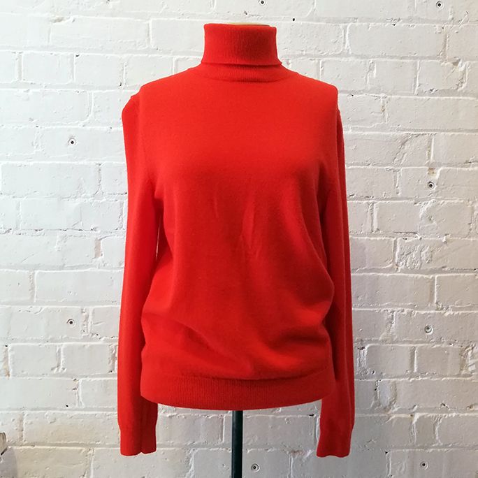Italian wool polo neck knit.