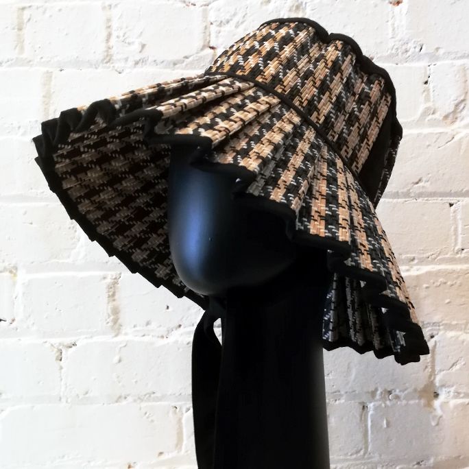 Handmade natural fibre bonnet.