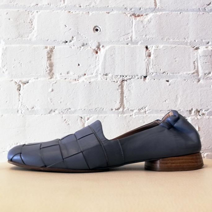 Woven leather slip-on.