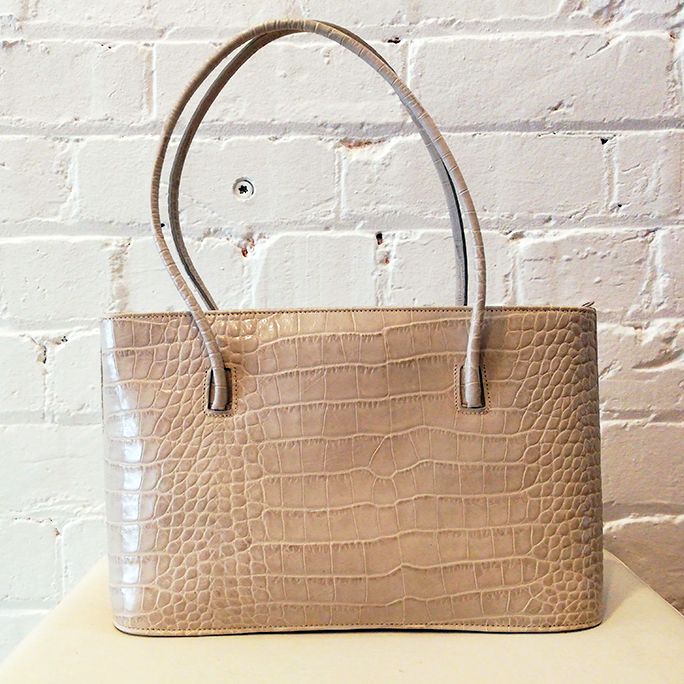 Textured leather hand bag.
