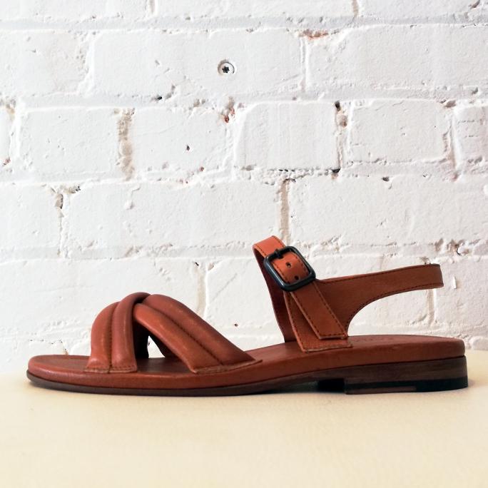 Soft leather sandal with ankle strap.
