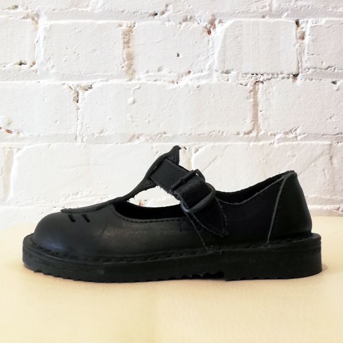 Leather child T-bar shoe.