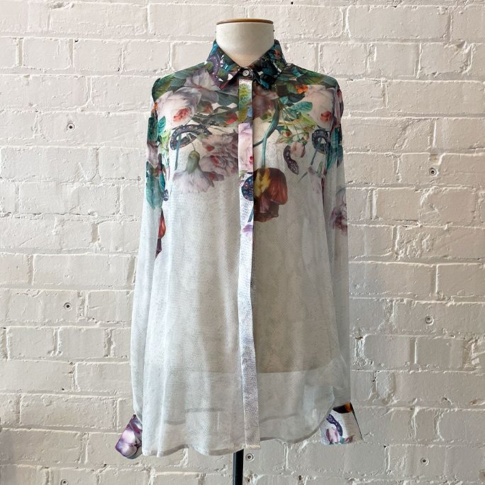 Silk shirt with floral print.