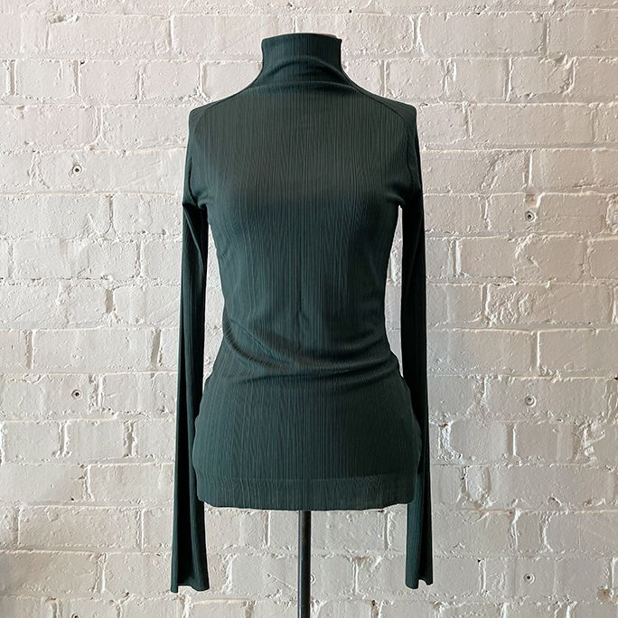 "Vernea" turtleneck top.