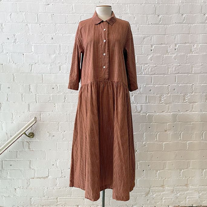 Cotton shirt dress with drop-waist and pockets.