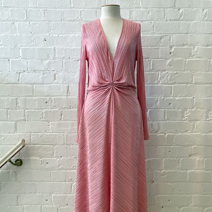 Long sleeve gown with deep v front.