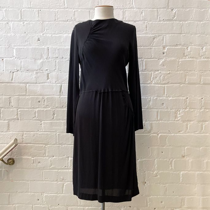 Long sleeve silk shift dress.