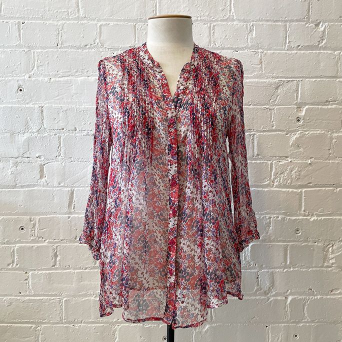 Light silk floral blouse with 3/4 sleeve.
