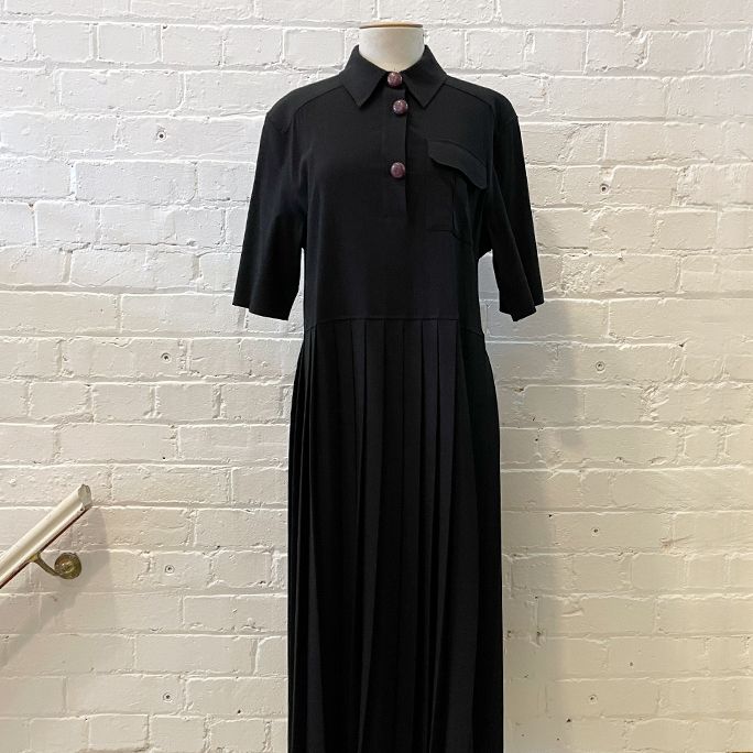 Box-pleat shirt dress with pockets.