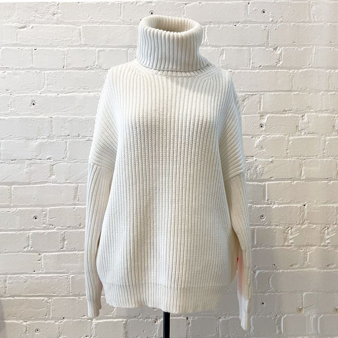 Oversize loose-weave knit top.
