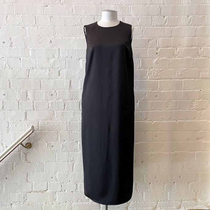 Long shift dress with pockets, fully lined.