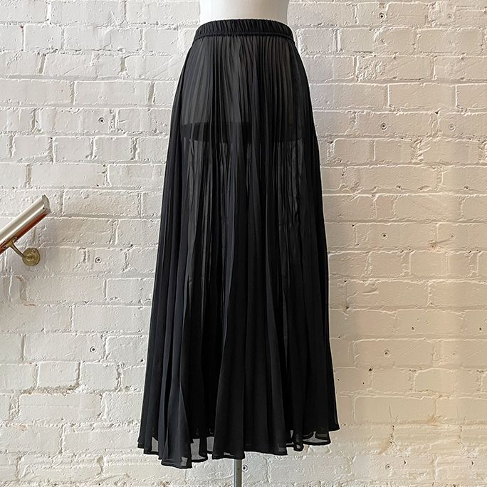 Sheer pleated long skirt with elasticated waist.