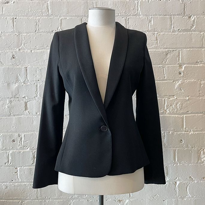 Slim fit jacket with single button, fully lined.