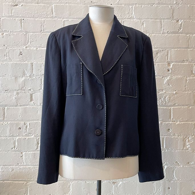 Patch pocket jacket with tacking.