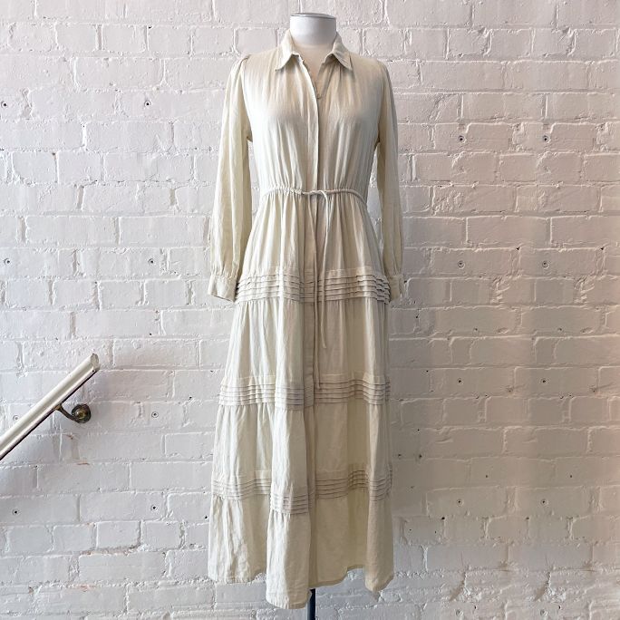 Shirt dress with draw string waist.